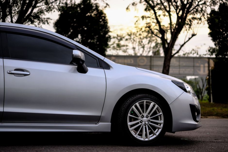 Professional ceramic car window tinting film on sedan in Andheri Mumbai
