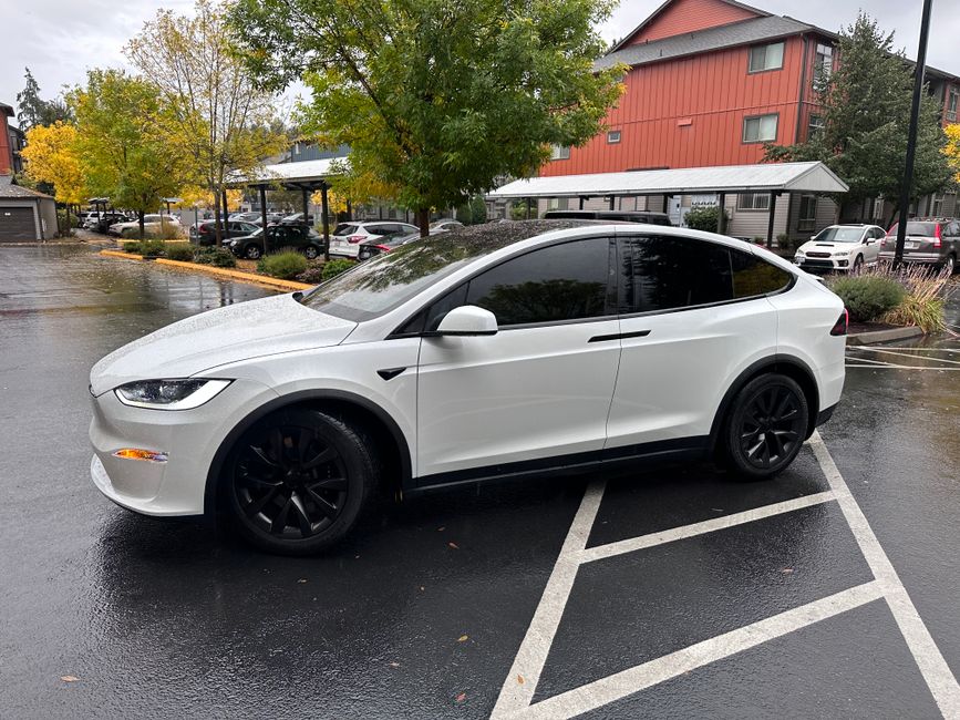 Dark charcoal car side window tinting film installation in Juhu Mumbai
