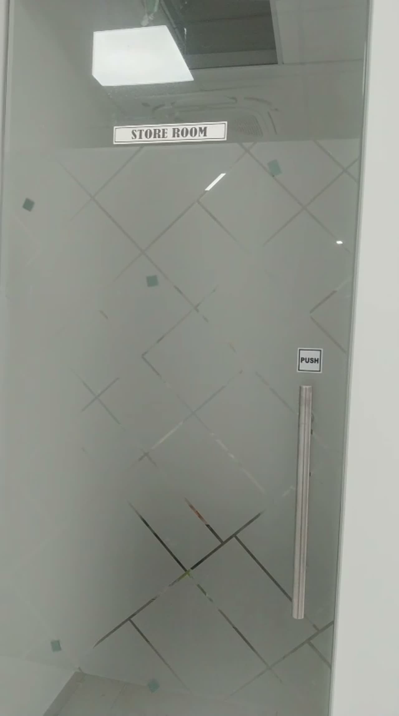 Frosted glass store room door with diamond lattice film, STORE ROOM nameplate and PUSH sign