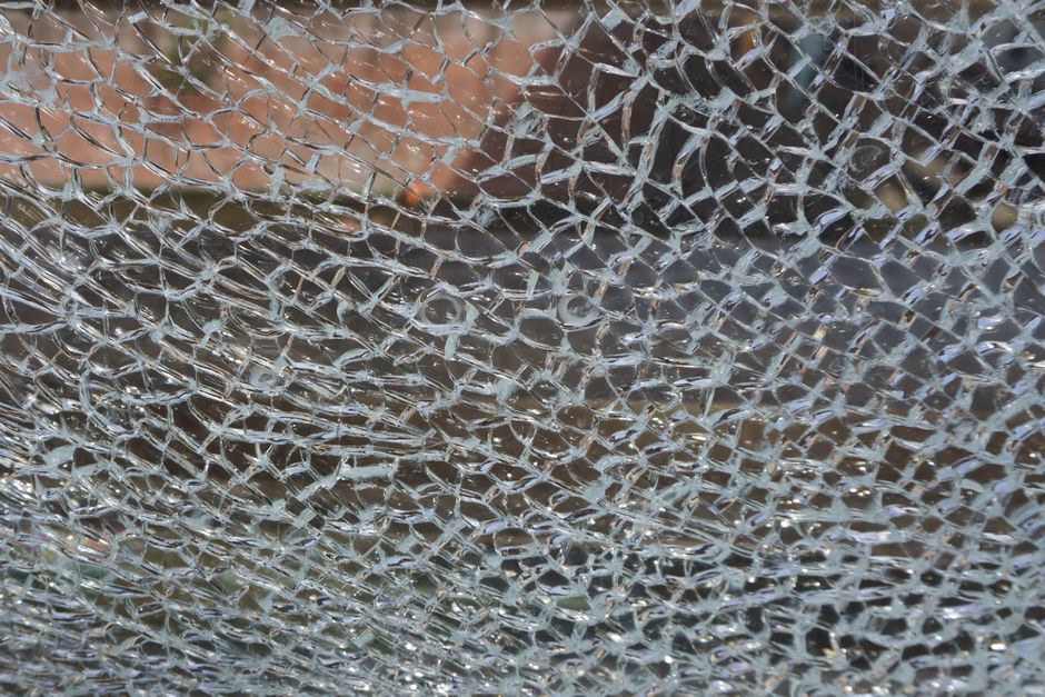 Anti-shatter safety window film on full-glass entrance door of residential home, Borivali East Mumbai
