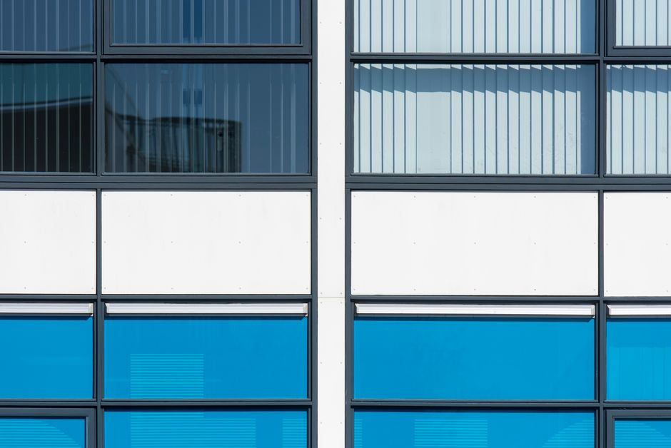 Solar tinting film on glass walls of tech park office campus, Thane