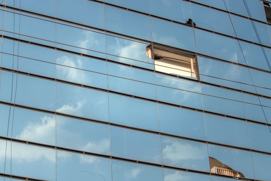 Sun control window film on ground-floor commercial complex facade, Andheri Mumbai